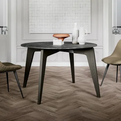 Tavolo rotondo Magic con top in laminato e gambe in massello di Frassino verniciato di Arredo3