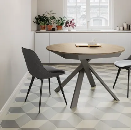Tavolo rotondo allungabile Twist con top in laminato e gambe in metallo verniciato di Arredo3